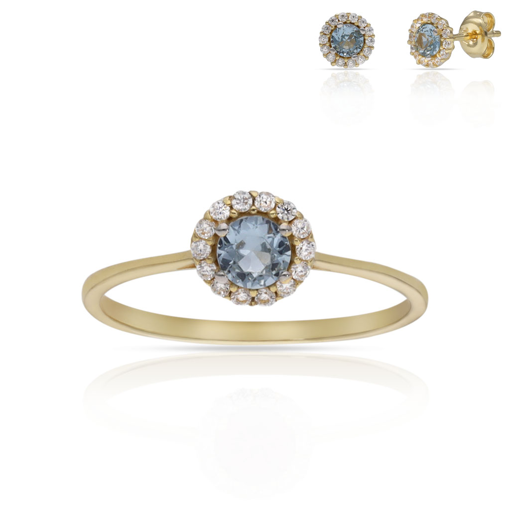 SORTIJA ORO 18KL CERCO CIRCONITAS + PIEDRA AGUA - 6MM